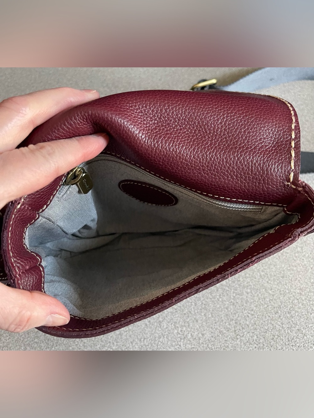 Roots  Leather Saddle Crossbody Bag in Deep Plum - Picture 9 of 14